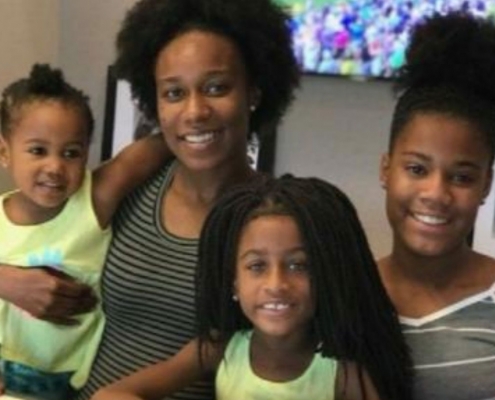 Dominique S. and her three young girls.